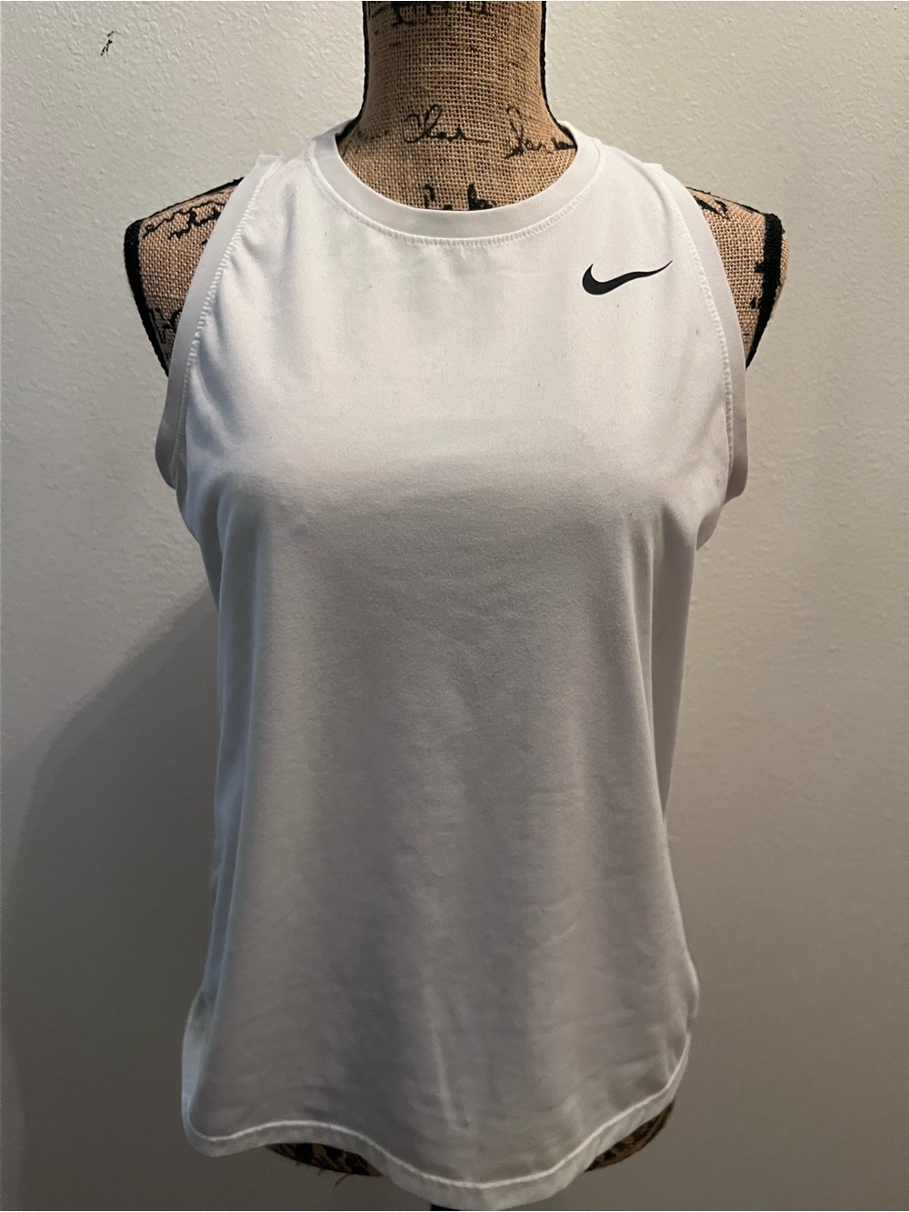 Nike White Women’s Sleeveless Athletic Tank with Black Swoosh